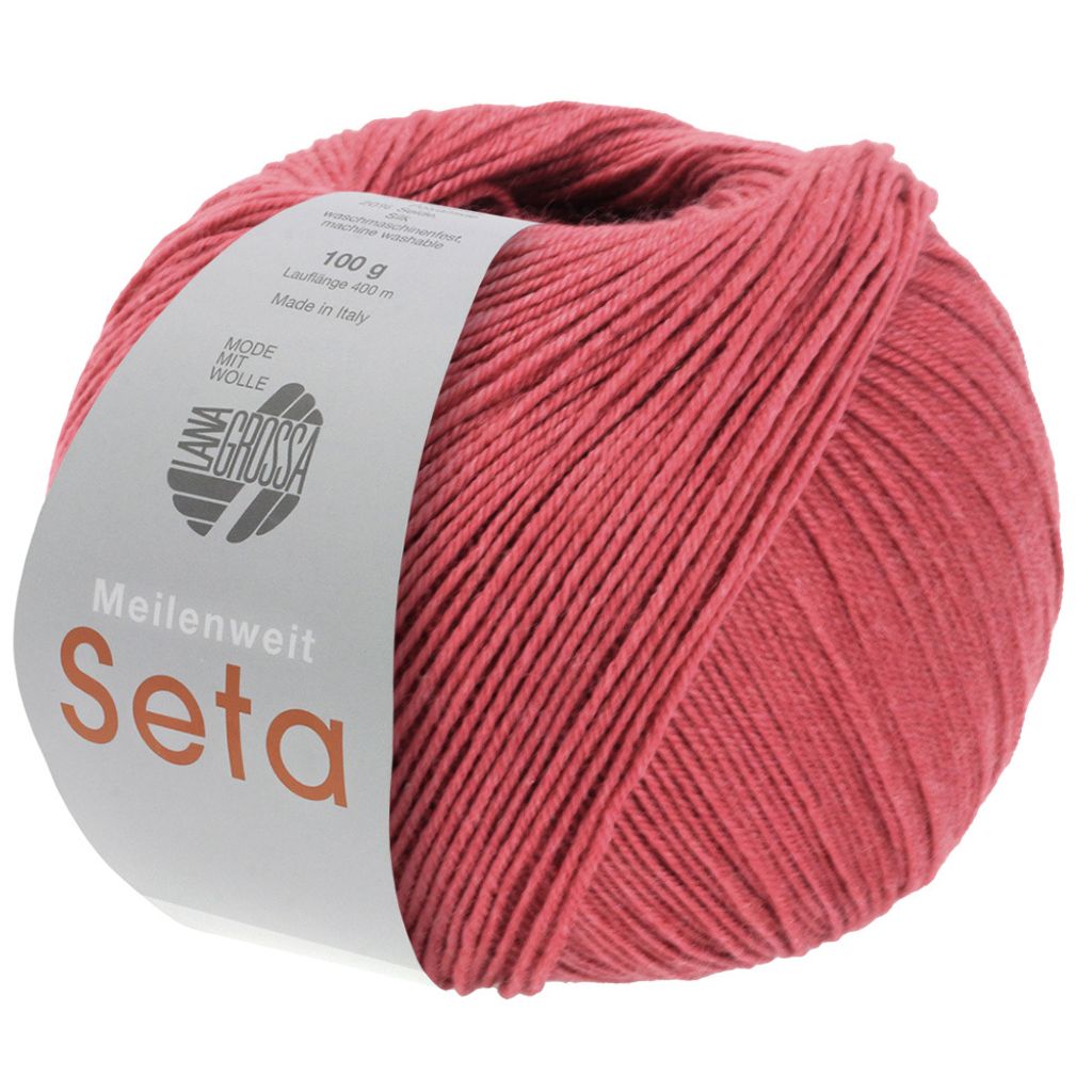 A ball of red yarn with a label.