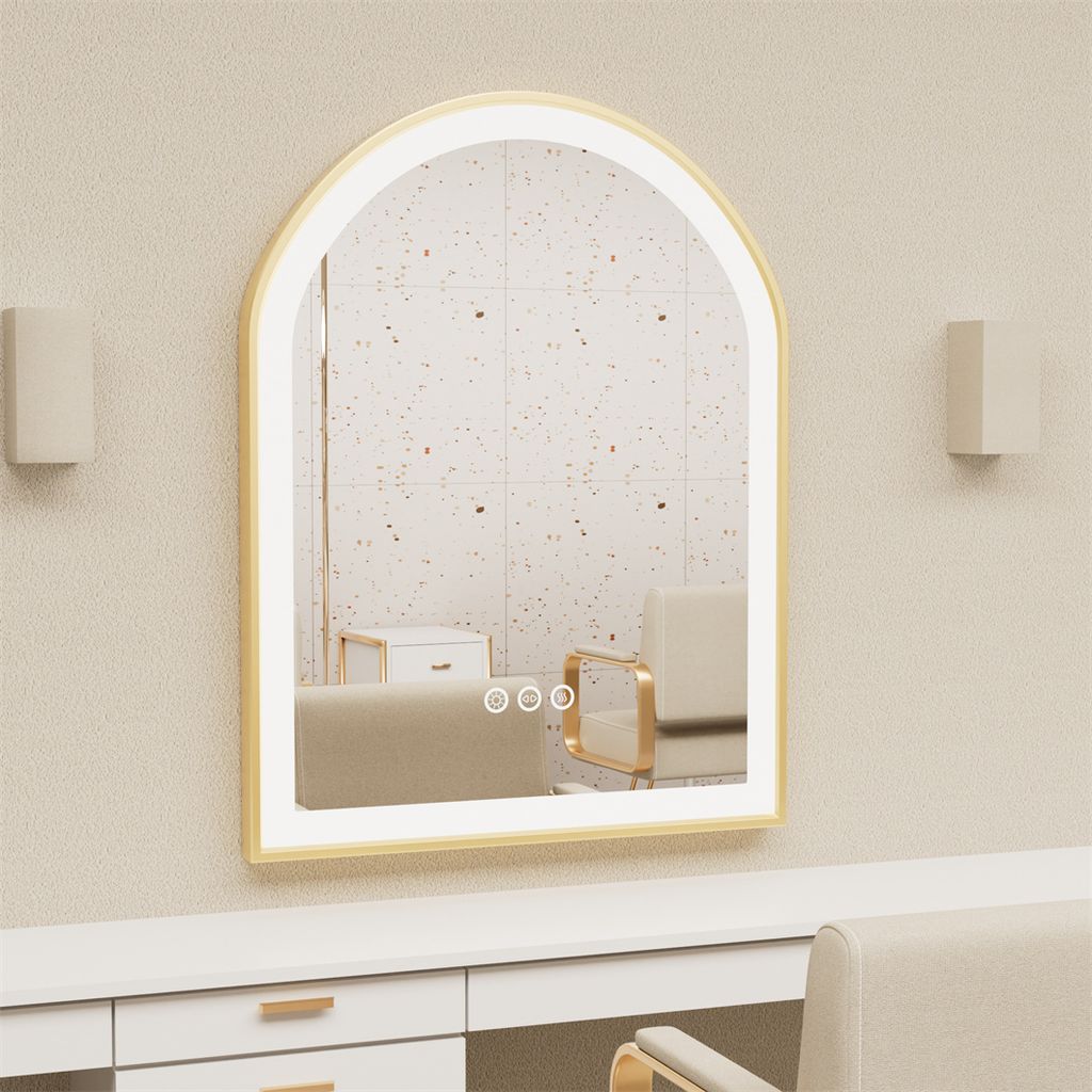 A well-lit vanity area with a large arched mirror with integrated LED lighting.