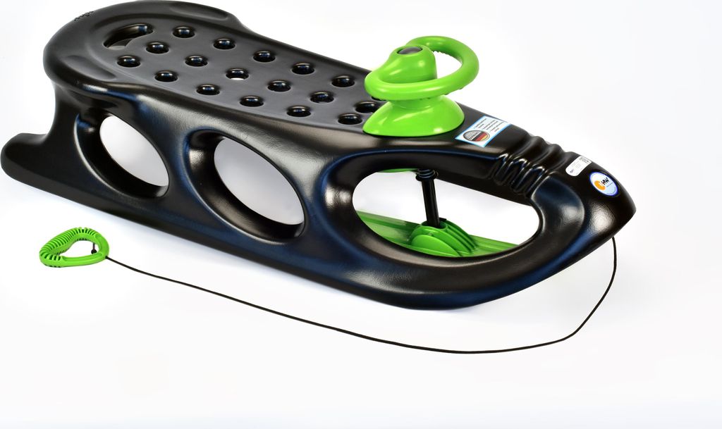 A black and green plastic sled with a steering wheel and a tow rope, isolated on a white background.
