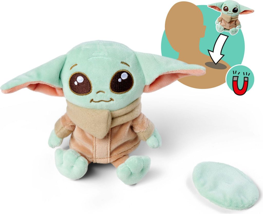 A plush toy of Grogu from Star Wars, sitting on a white background. An inset graphic shows how the toy can be attached to a person's shoulder using a magnet.