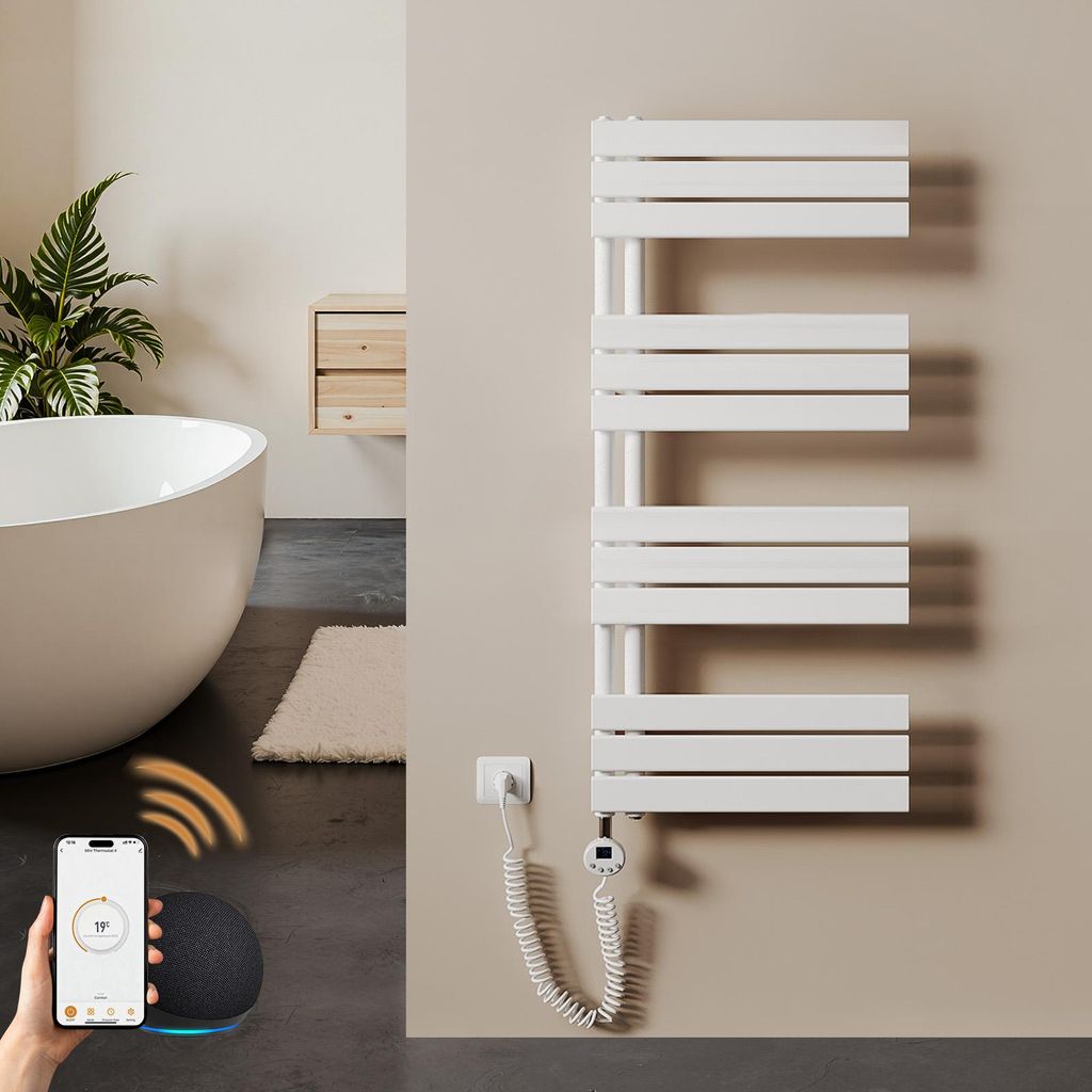 A modern bathroom with a freestanding bathtub, a plant, and a white electric towel warmer.