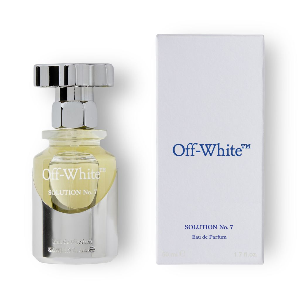 A perfume bottle and its box are displayed against a white background.