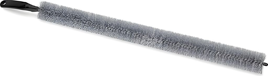 A long, bristled cleaning brush with a black handle, isolated on a white background.