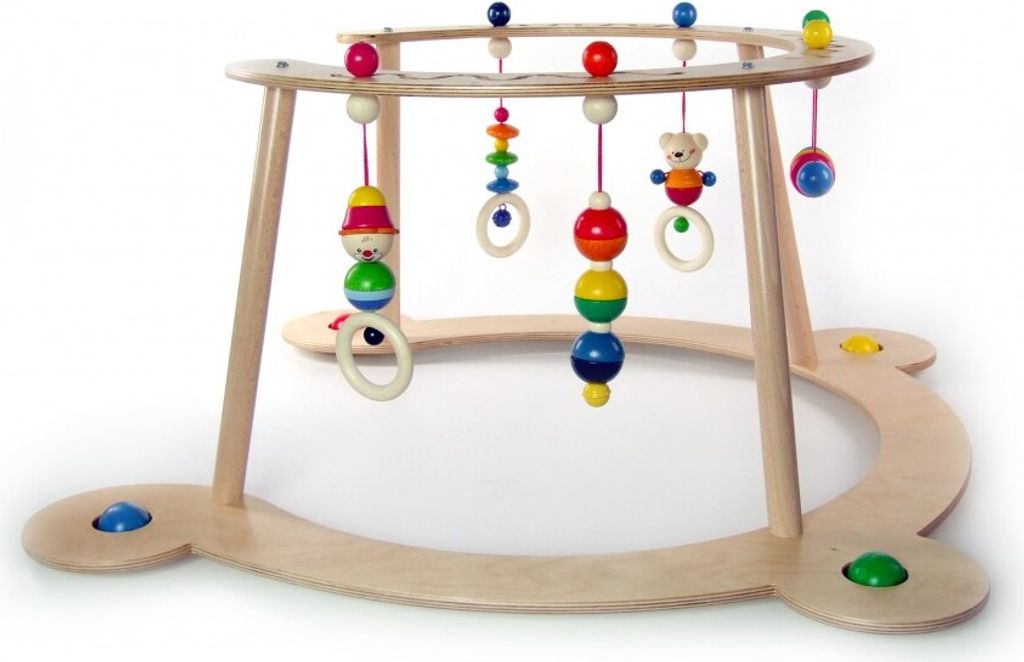 A wooden baby walker with hanging toys.