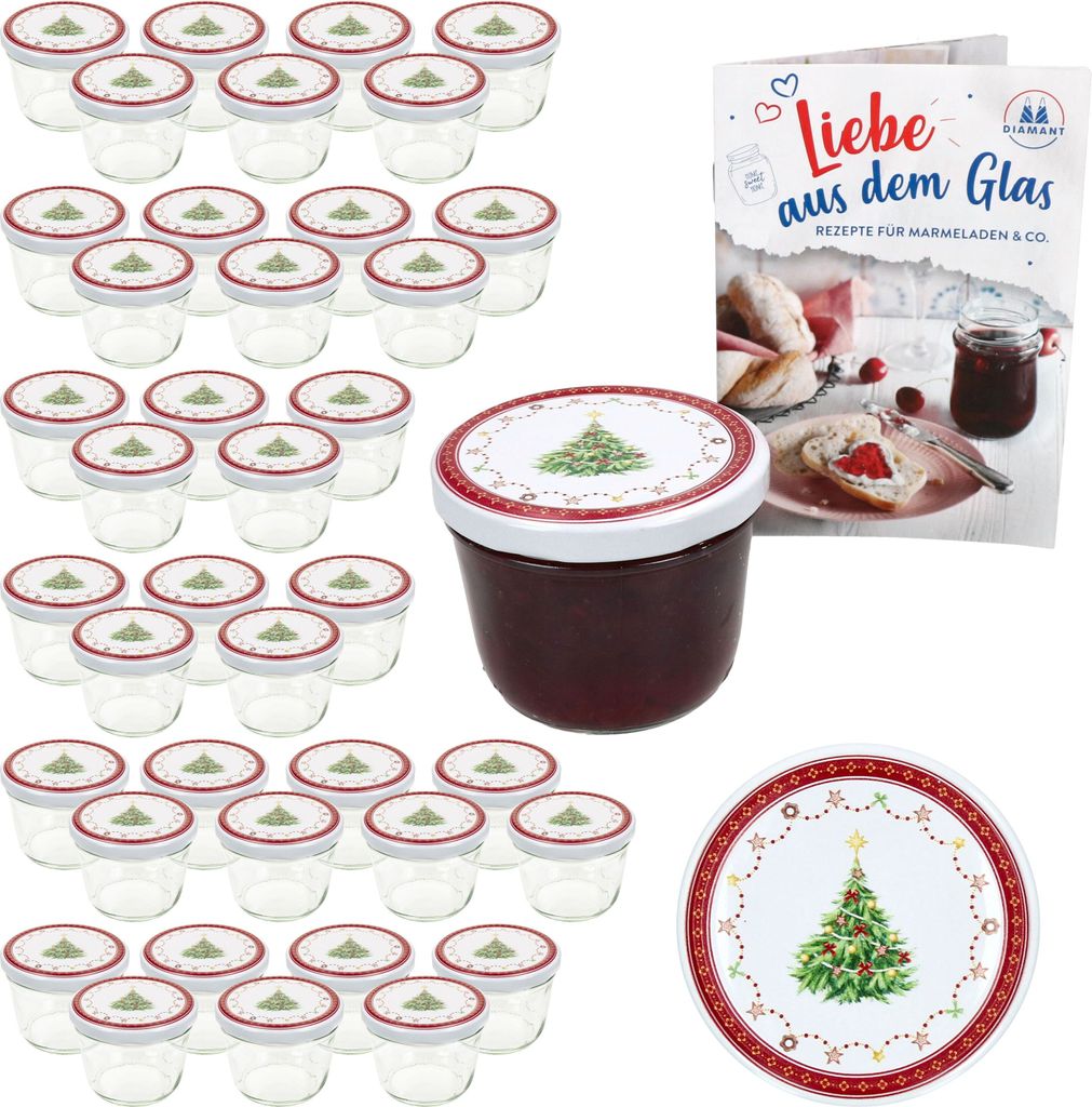 A set of glass jars with lids, a jar of jam, a recipe book, and a decorative plate, all with a Christmas theme.