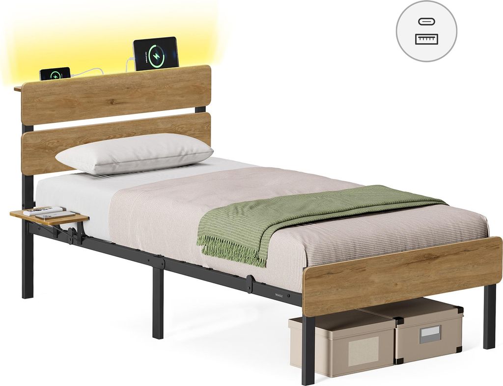 A single bed with a headboard featuring LED lighting and USB ports, shown with bedding and storage boxes underneath.