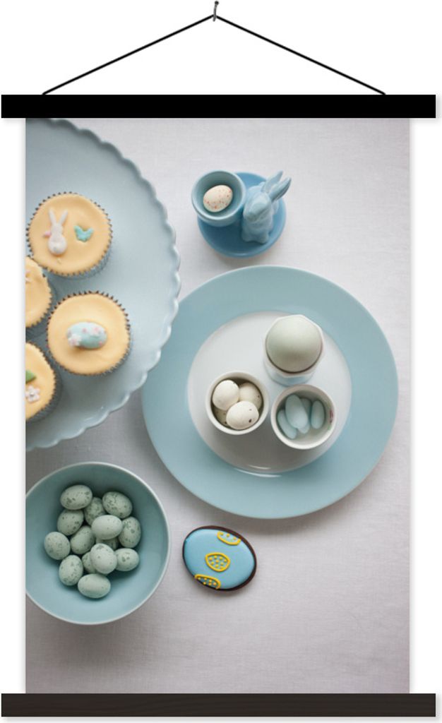MuchoWow Textilposter Ein Ostertisch gefüllt mit Cupcakes und Süßigkeiten 40x60 cm mit schwarzem Rahmen - Wanddekorationen