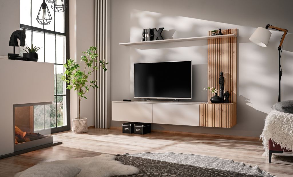 A modern living room with a wall-mounted entertainment unit, fireplace, and large window.