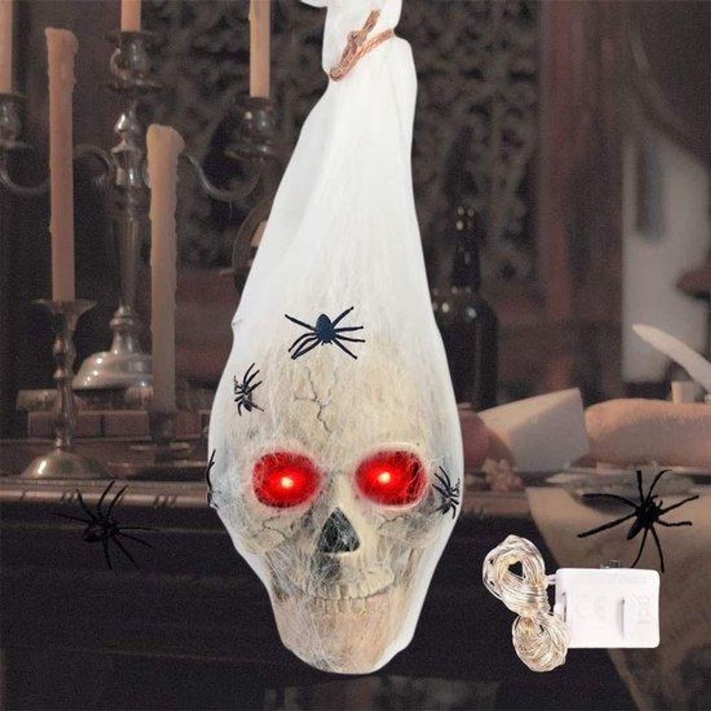 Halloween-Schädel mit Lichtslinger und leuchtenden Augen