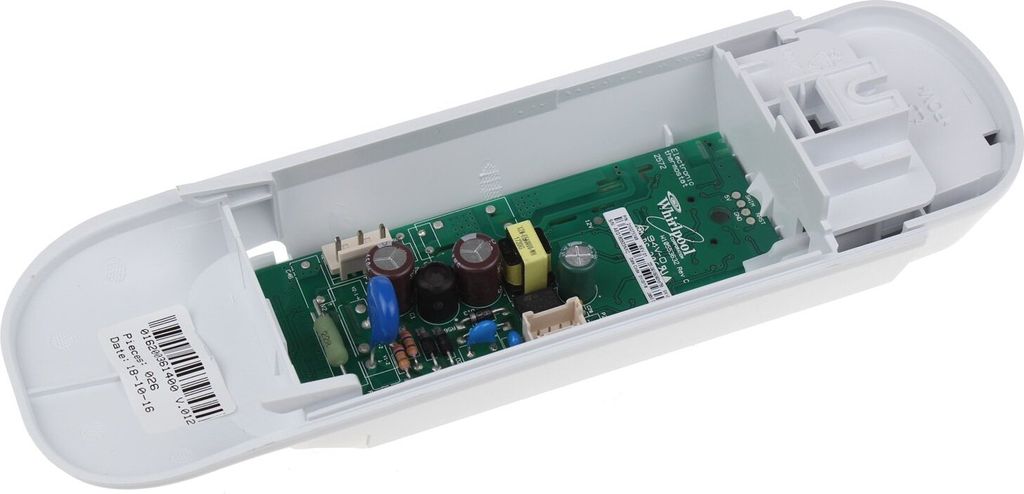 A white plastic housing containing a green circuit board with various electronic components.