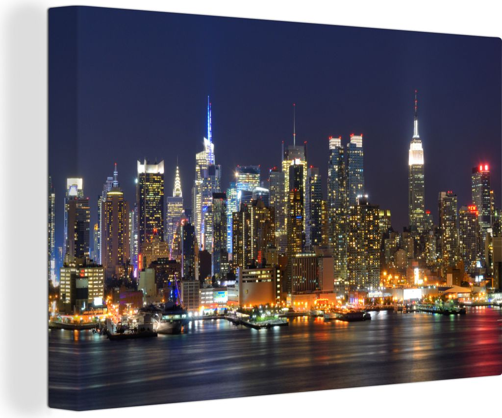 OneMillionCanvasses - Leinwandbilder - 140x90 cm, Reflexion von beleuchteten Gebäuden in einem Stadtzentrum, Wandbilder Kunstdruck Wanddekoratio...