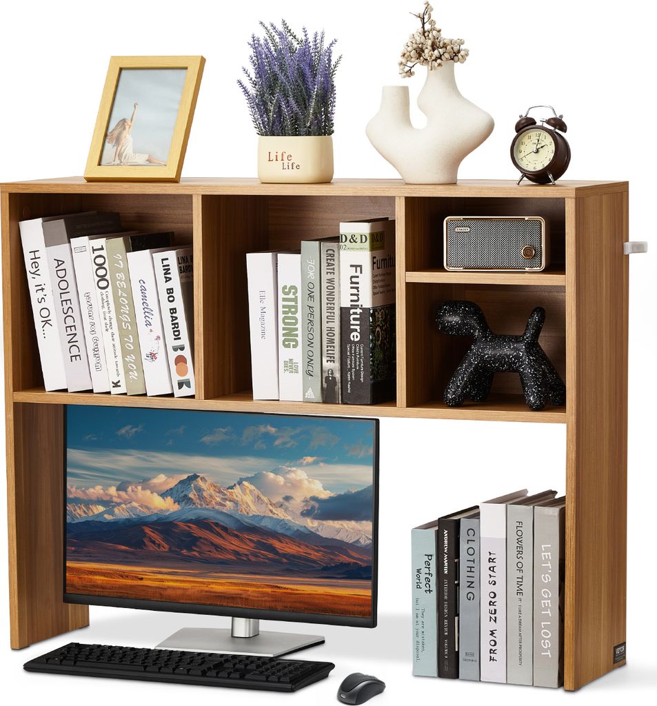 A wooden desk shelf unit with books, a monitor, keyboard, mouse, and decorative items.