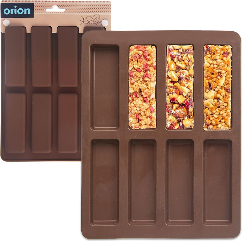 A brown silicone mold for making granola bars, with some granola bars already made in some of the molds.