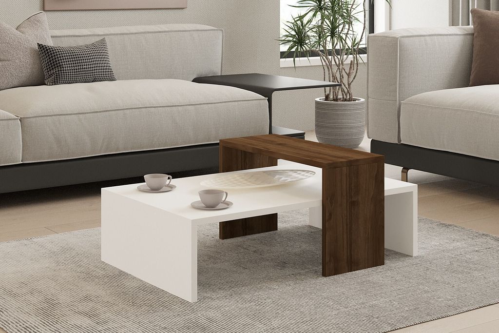 A modern living room scene with a couch and coffee table.