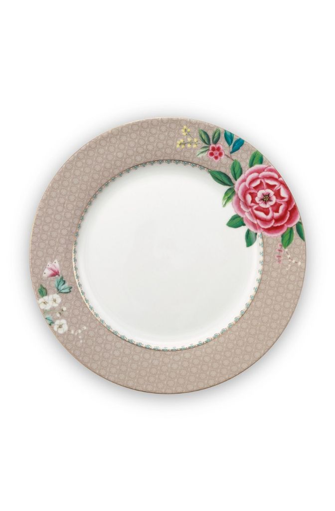 A single plate with a floral design on a white background.