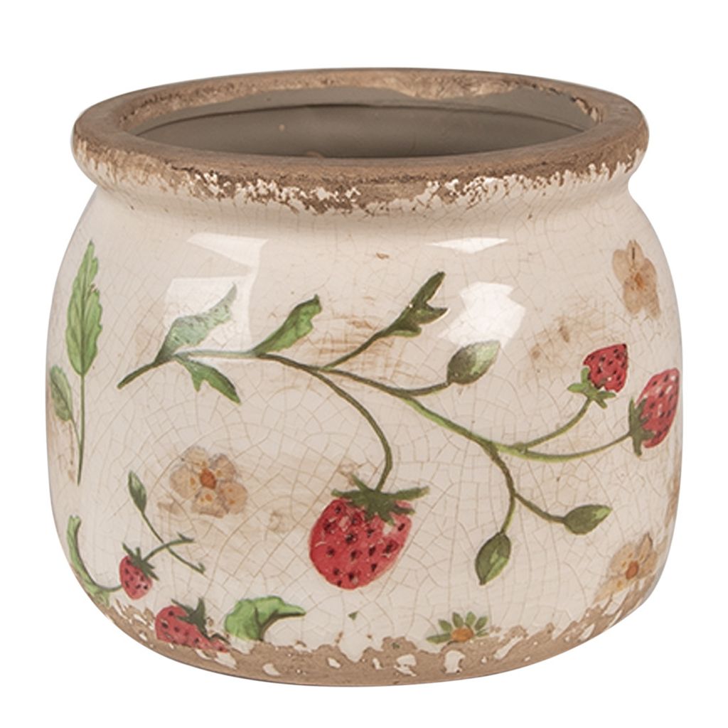 A ceramic pot with a strawberry design.