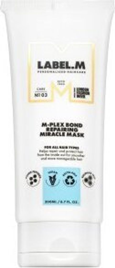 A white tube of hair mask with product information and branding.