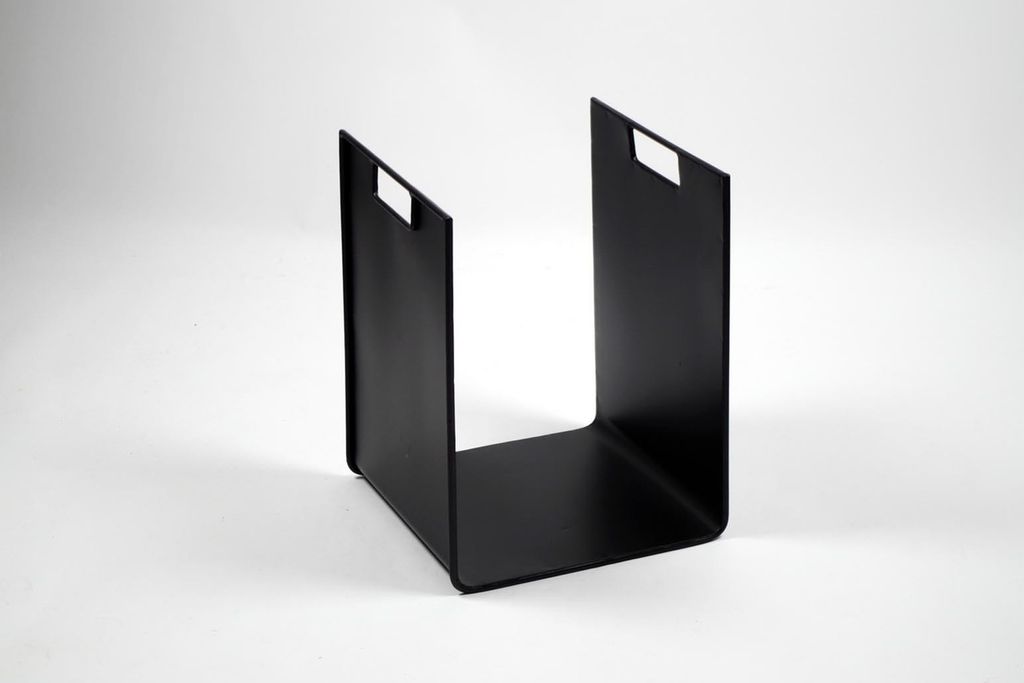 A black metal firewood rack is shown against a white background.