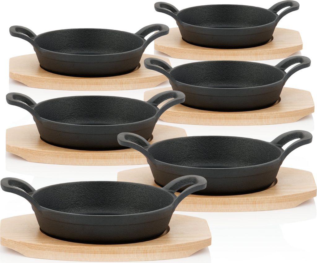 A set of six cast iron serving pans with wooden bases, arranged in three rows on a white background.