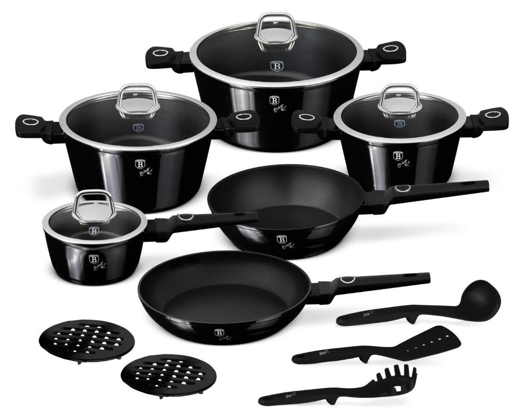 A collection of black cookware and kitchen utensils arranged on a white background.