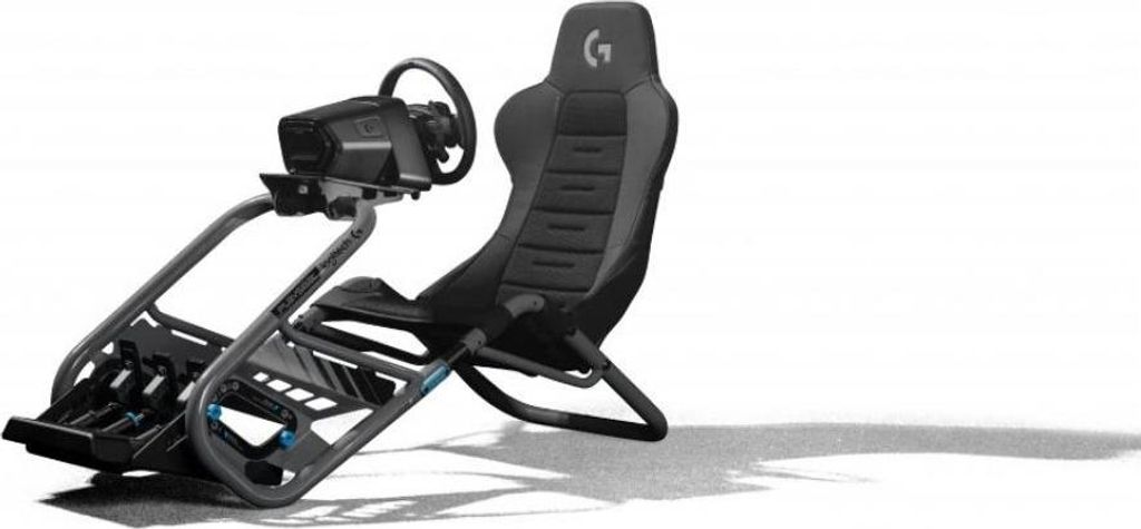A racing simulator seat with a steering wheel and pedals, shown against a white background.