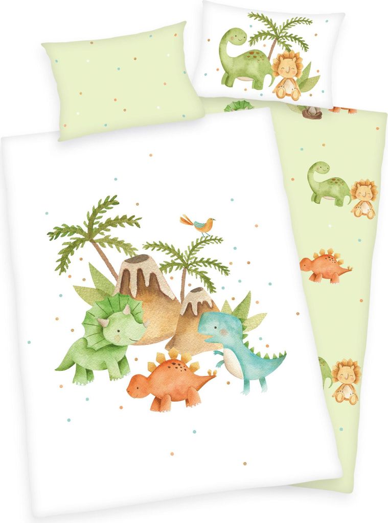 A children's bedding set with a dinosaur theme, featuring illustrations of dinosaurs, volcanoes, and palm trees.