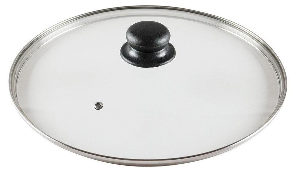 A glass lid for a pot or pan, viewed from above.