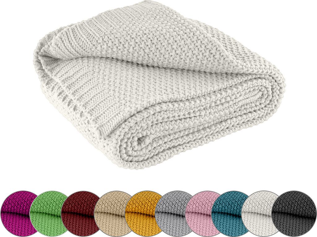 A folded white knitted blanket is shown against a white background. Below the blanket are circular swatches of various colors, likely representing other available colors for the product.