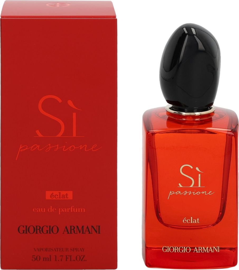 A red perfume bottle and its packaging are displayed against a white background.