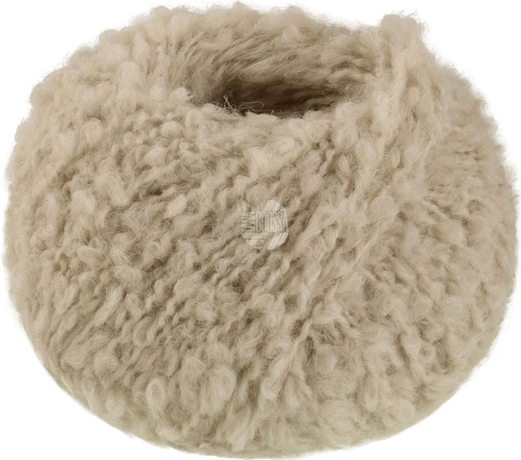A ball of fluffy, cream-colored yarn.