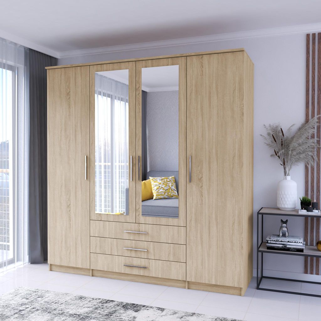 A light-colored wooden wardrobe with mirrored doors and drawers, set in a bedroom or dressing room setting.