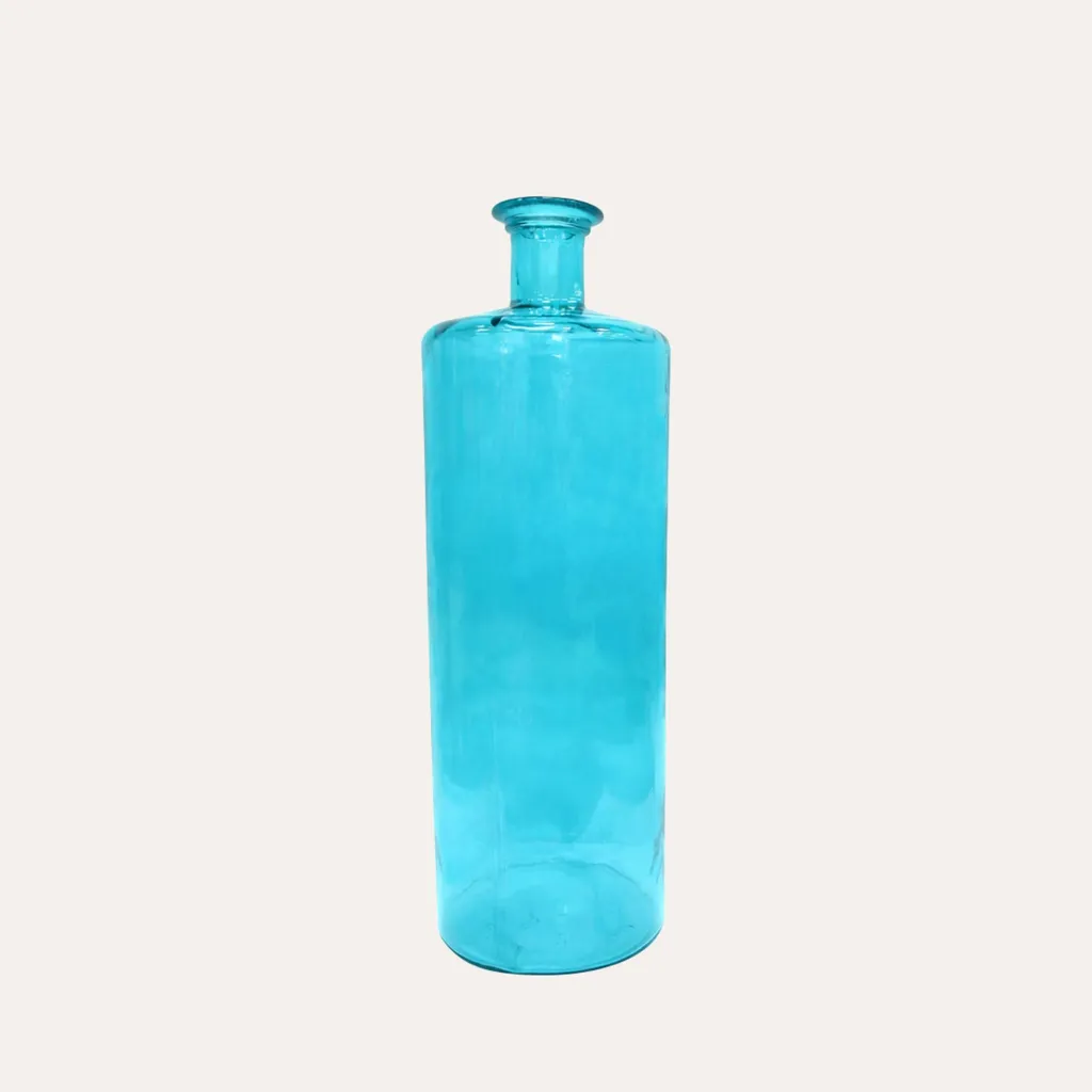 Décoration de salon : grande bouteille turquoise en verre pour pampas