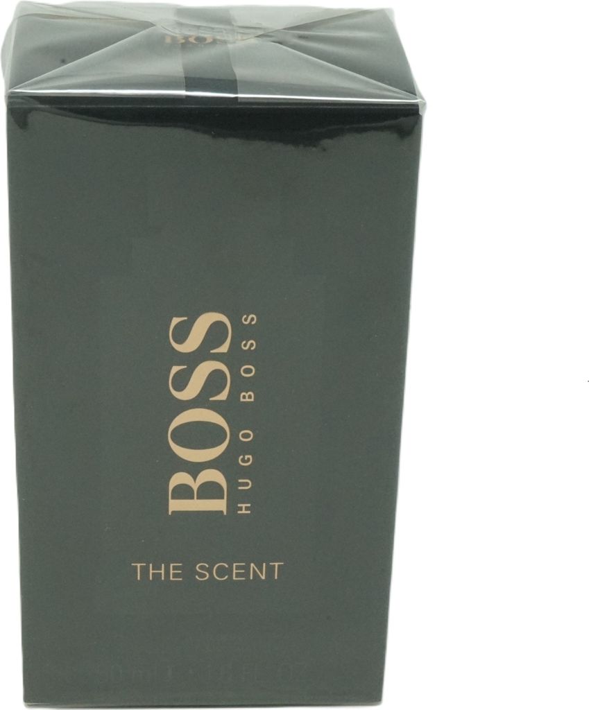 A dark green box of Hugo Boss The Scent perfume, wrapped in clear plastic.