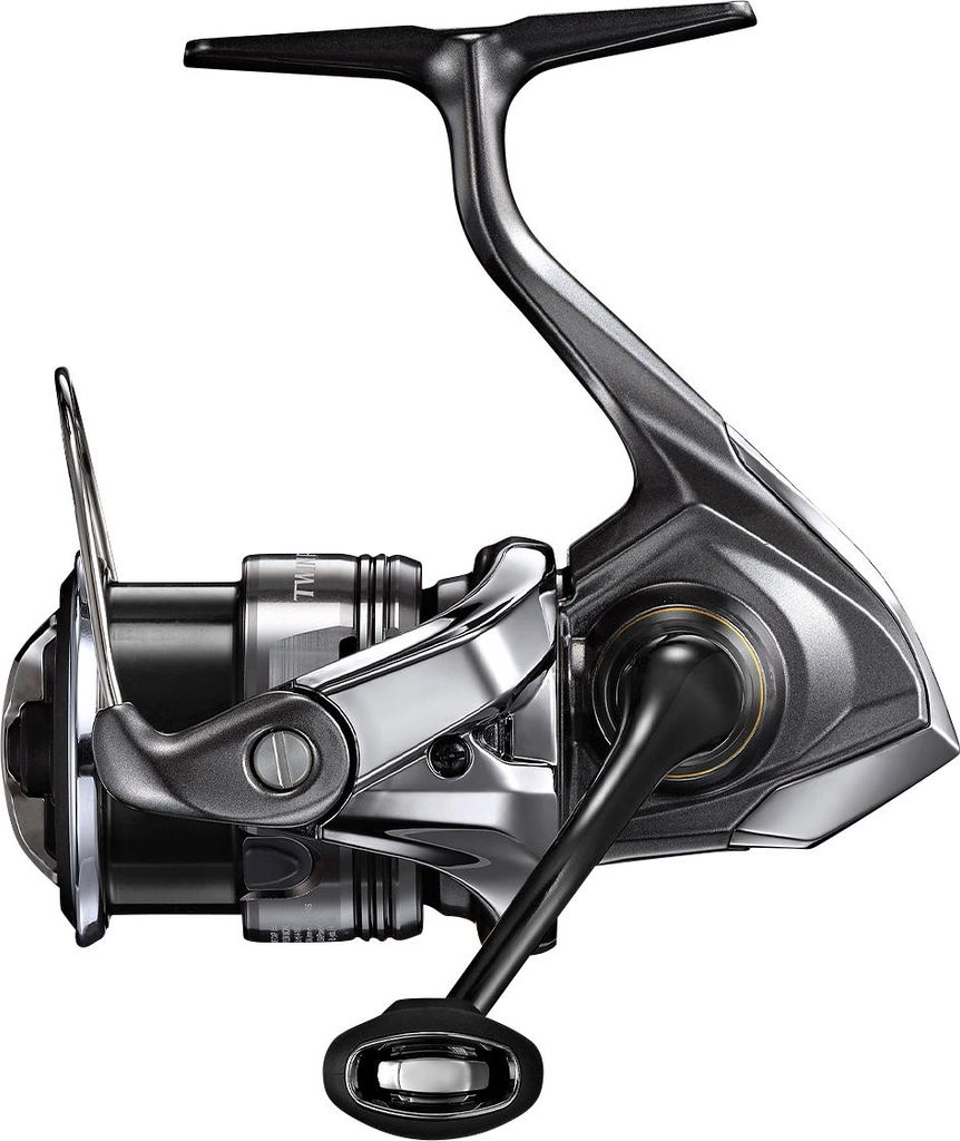 A studio shot of a fishing reel against a white background.