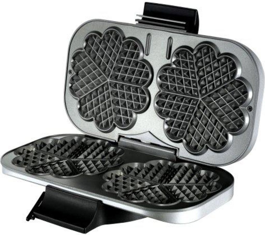 An open waffle maker with heart-shaped waffle plates.