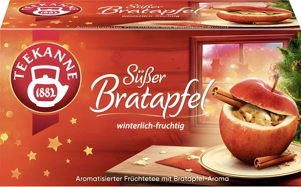 A box of Teekanne 'Süßer Bratapfel' (Sweet Baked Apple) fruit tea, featuring a festive winter theme with an image of a baked apple and a Christmas tree.