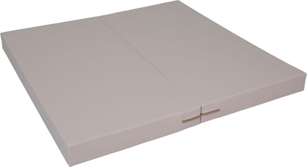 A closed, two-part beige gymnastics mat is shown from a slightly elevated angle against a white background.