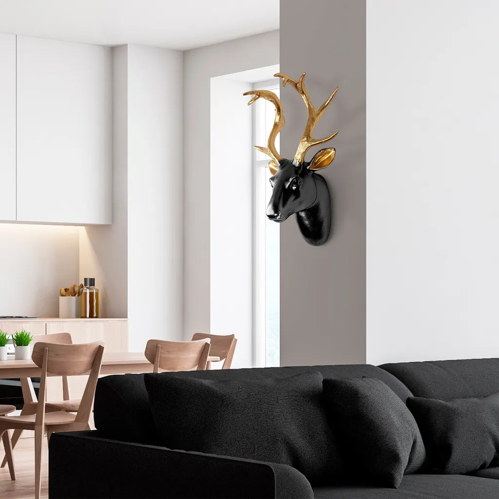 Décorer son salon avec une tête de cerf dorée - Accessoire chic Wallity