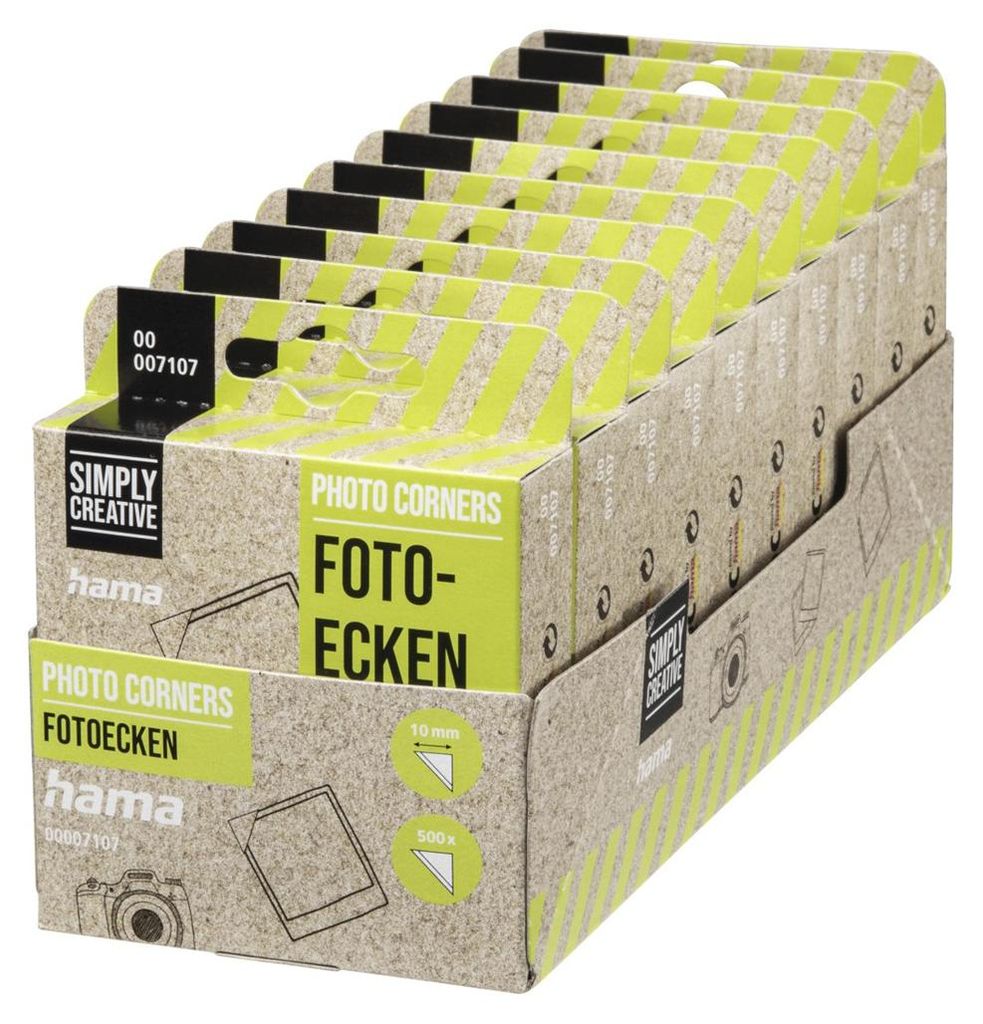 A display box filled with smaller boxes of photo corners.