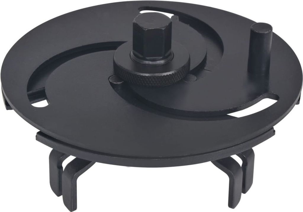 A black automotive tool for removing fuel pump lids.