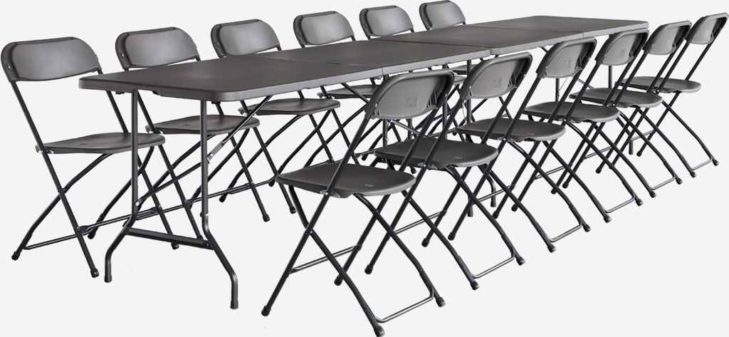 A set of folding tables and chairs arranged in a long line.