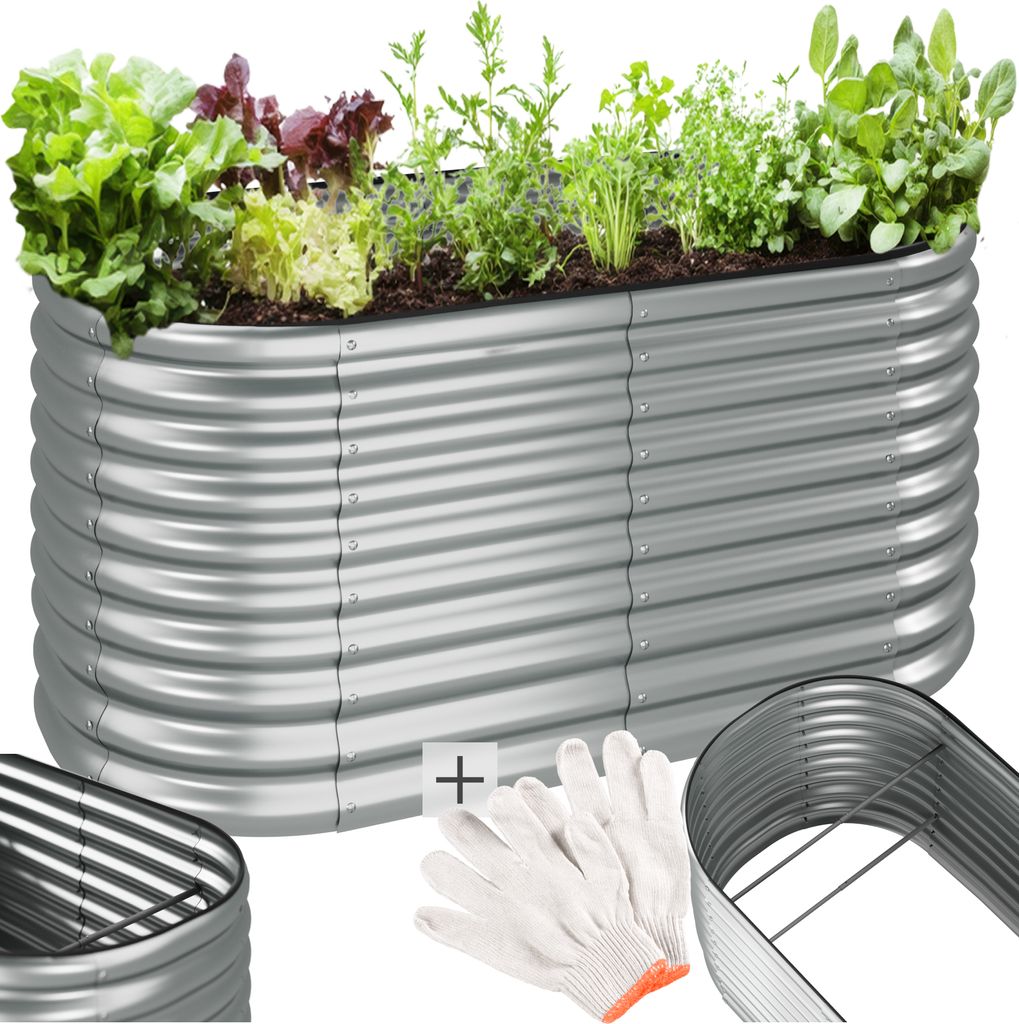 A raised garden bed filled with various plants, along with gardening gloves and a metal frame.
