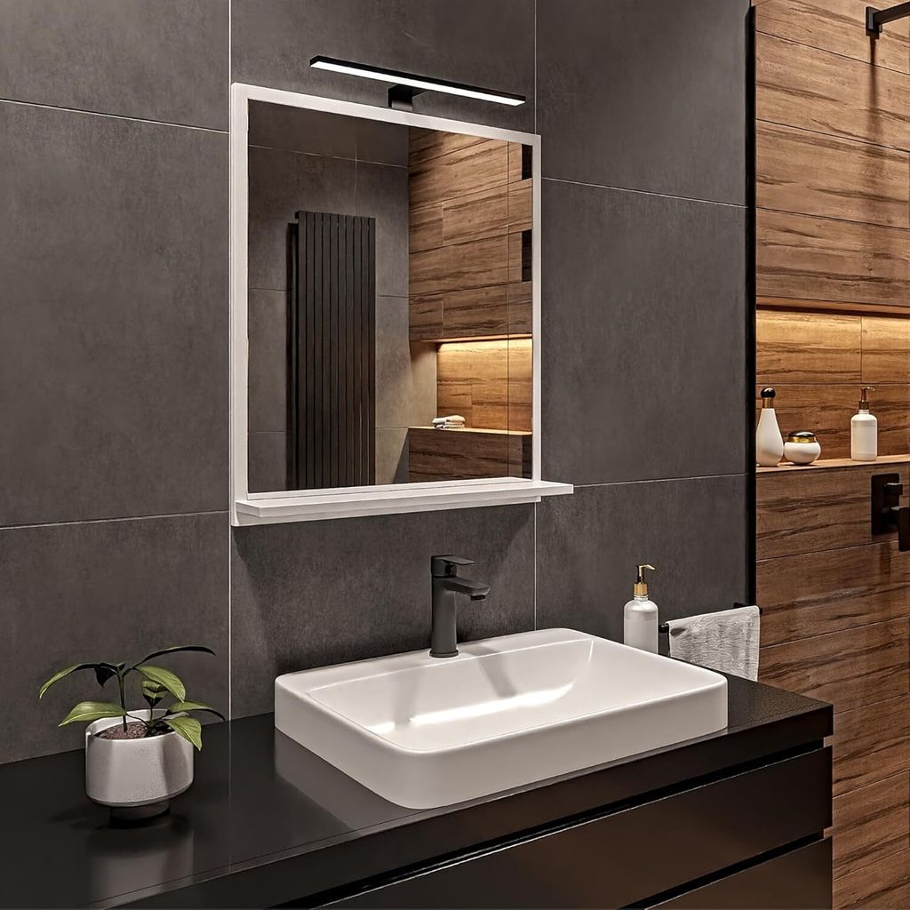A modern bathroom vanity with a rectangular mirror, sink, and faucet.