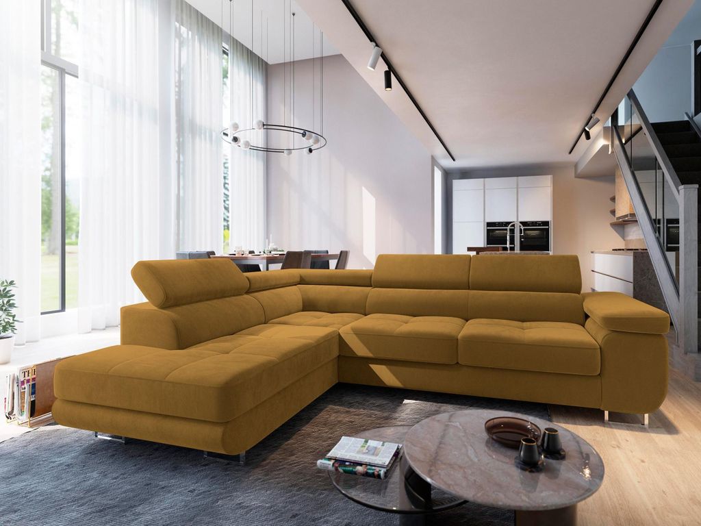 A modern living room with a large sectional sofa, coffee table, and dining area visible in the background.