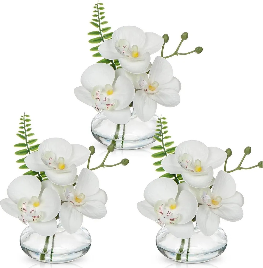 Orchidées artificielles au réalisme bluffant avec vase en verre blanc