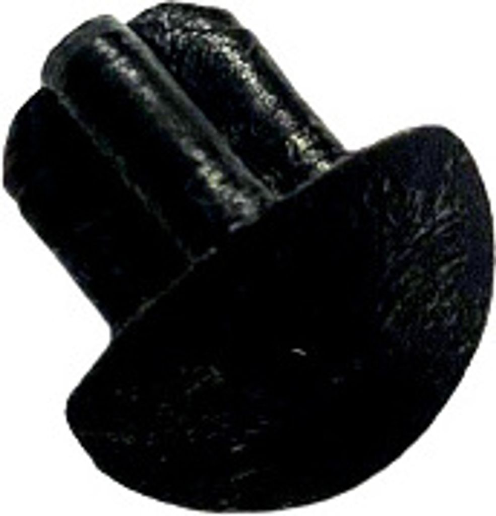 A black plastic cap with multiple prongs.