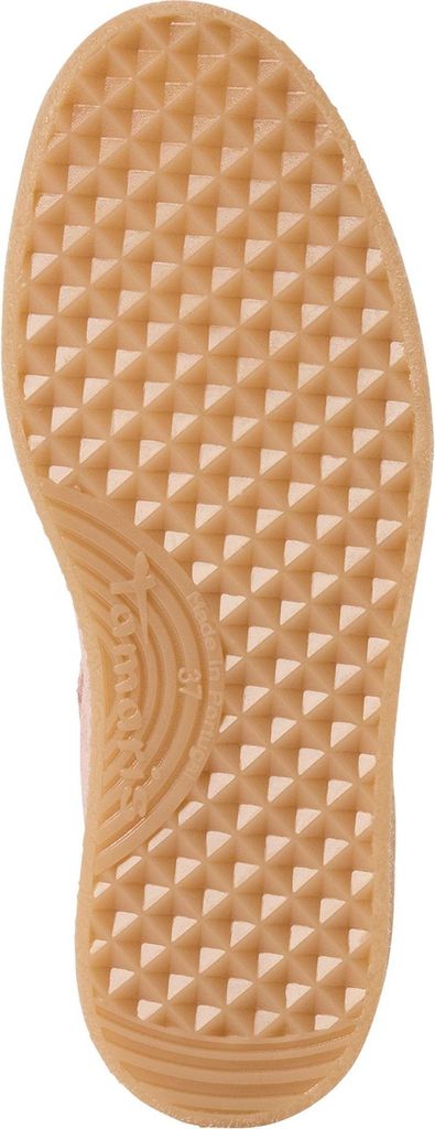 The image shows the sole of a shoe.