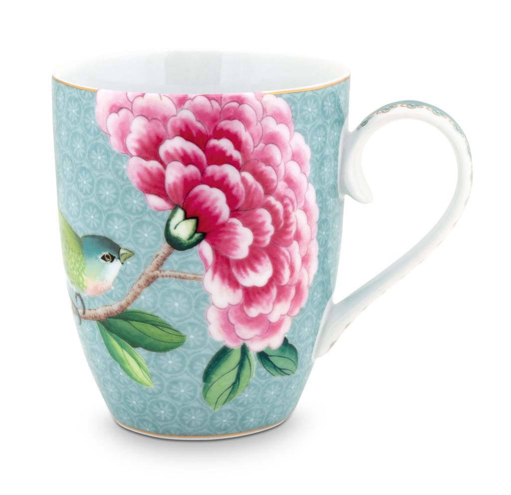 A close-up studio shot of a decorative mug.