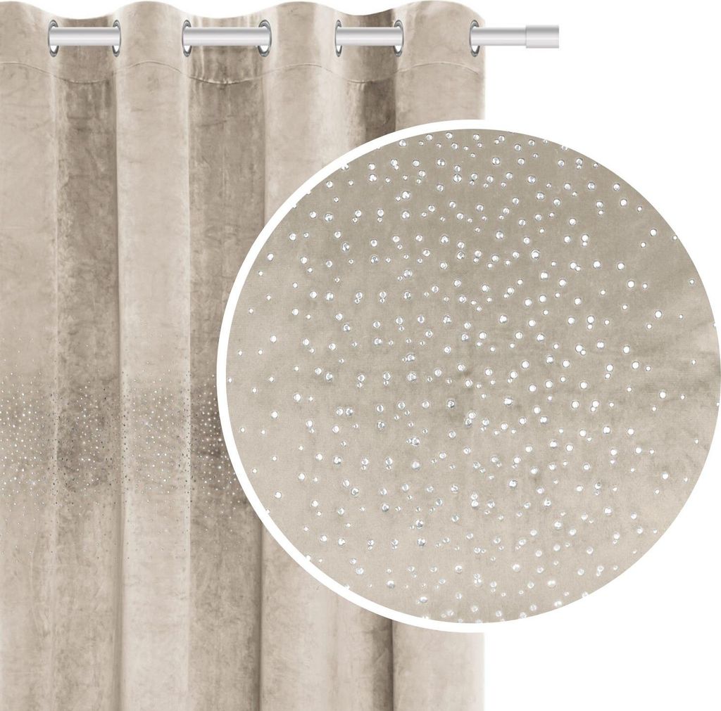 A close-up view of a beige velour curtain with crystal embellishments, showing the texture and sparkle.