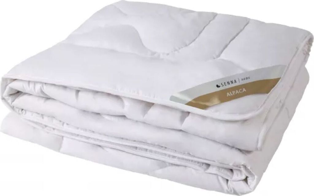 A folded white duvet is shown against a white background.